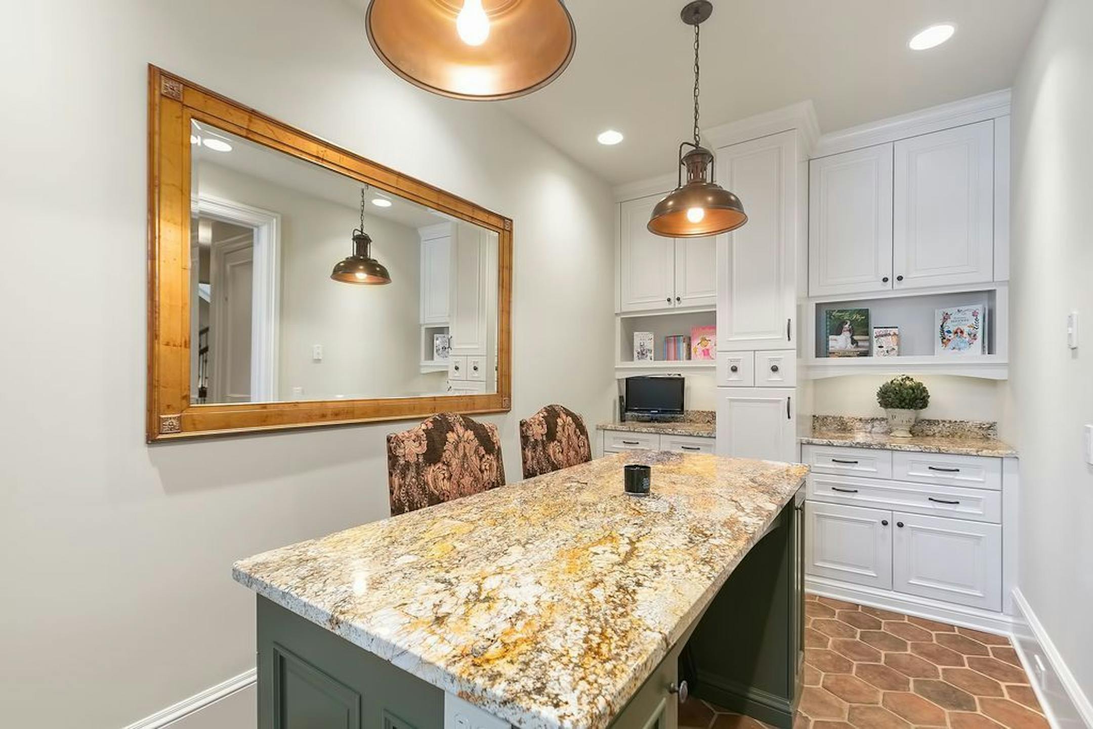 The butler's pantry offers prep space for caterers.