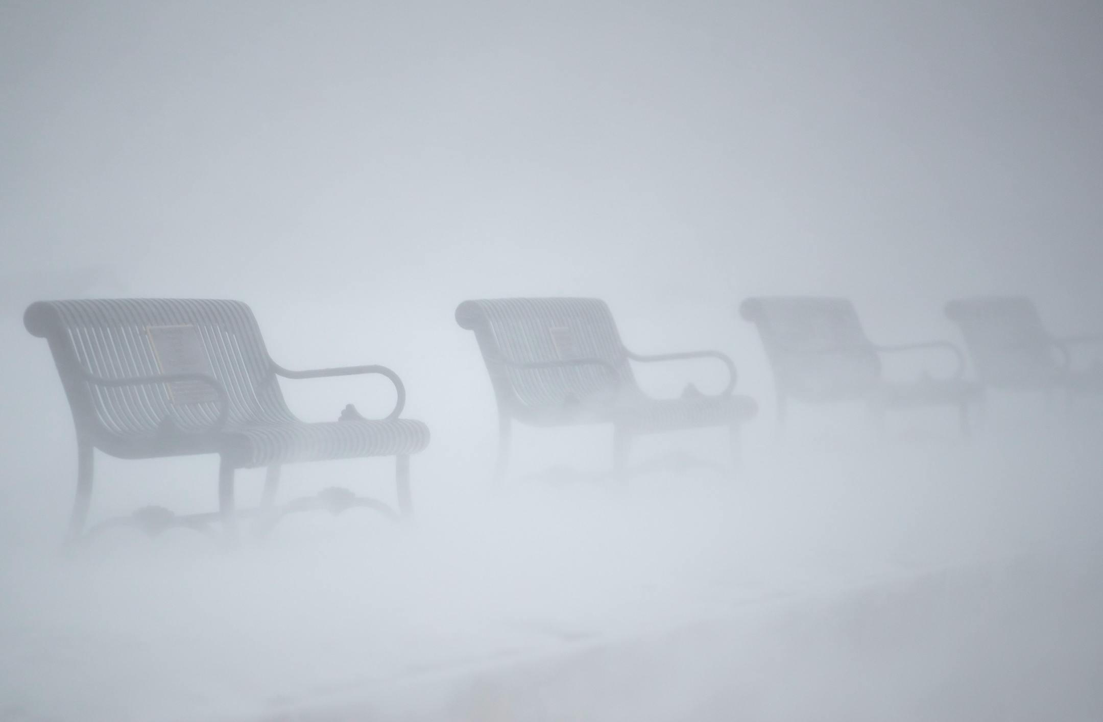 The wind was whipping along the shore of Lake Superior as Canal Park was all but empty on Wednesday evening. Only a few brave souls braced the wind and snow.