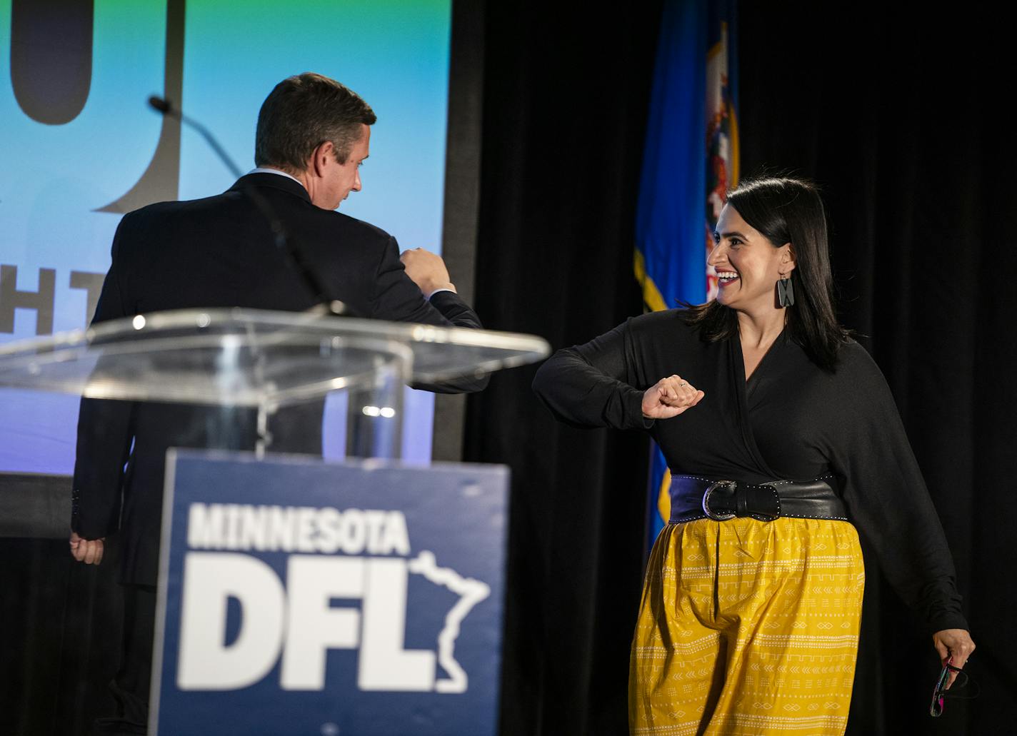 Lt. Governor Peggy Flanagan bumped elbows with DFL Party Chairman Ken Martin before she spoke during the DFL Election Night Watch Party. ] LEILA NAVIDI • leila.navidi@startribune.com BACKGROUND INFORMATION: DFL Election Night Watch Party at the Intercontinental Hotel in St. Paul on Tuesday, November 3, 2020.