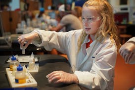Colbie Savageau,10, runs an experiment to test what antibacterial agents work best with the help of her aunt Jeanine Huberty.] After 20 years, the Sci