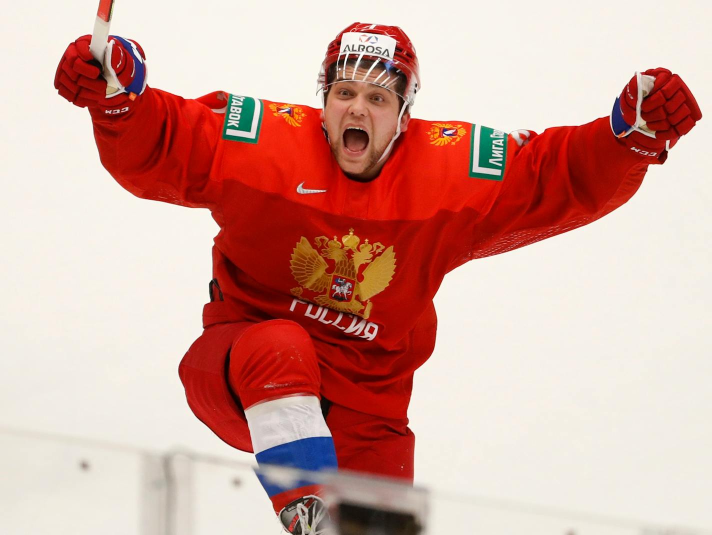 Russia's Alexander Khovanov celebrates after winning the U20 Ice Hockey Worlds semifinal match between Sweden and Russia in Ostrava, Czech Republic, Saturday, Jan. 4, 2020. (AP Photo/Petr David Josek)