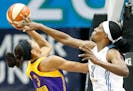 Sylvia Fowles (34) blocked a shot by Candace Parker (3) in the fourth quarter Tuesday.