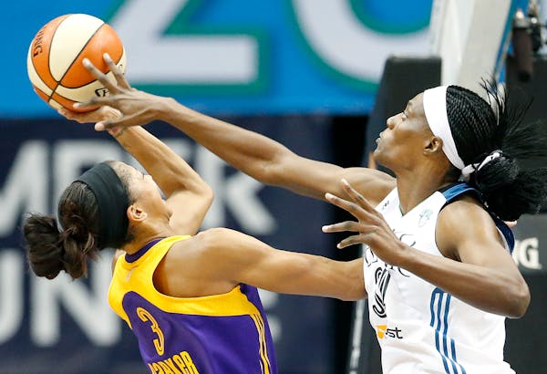 Sylvia Fowles (34) blocked a shot by Candace Parker (3) in the fourth quarter Tuesday.