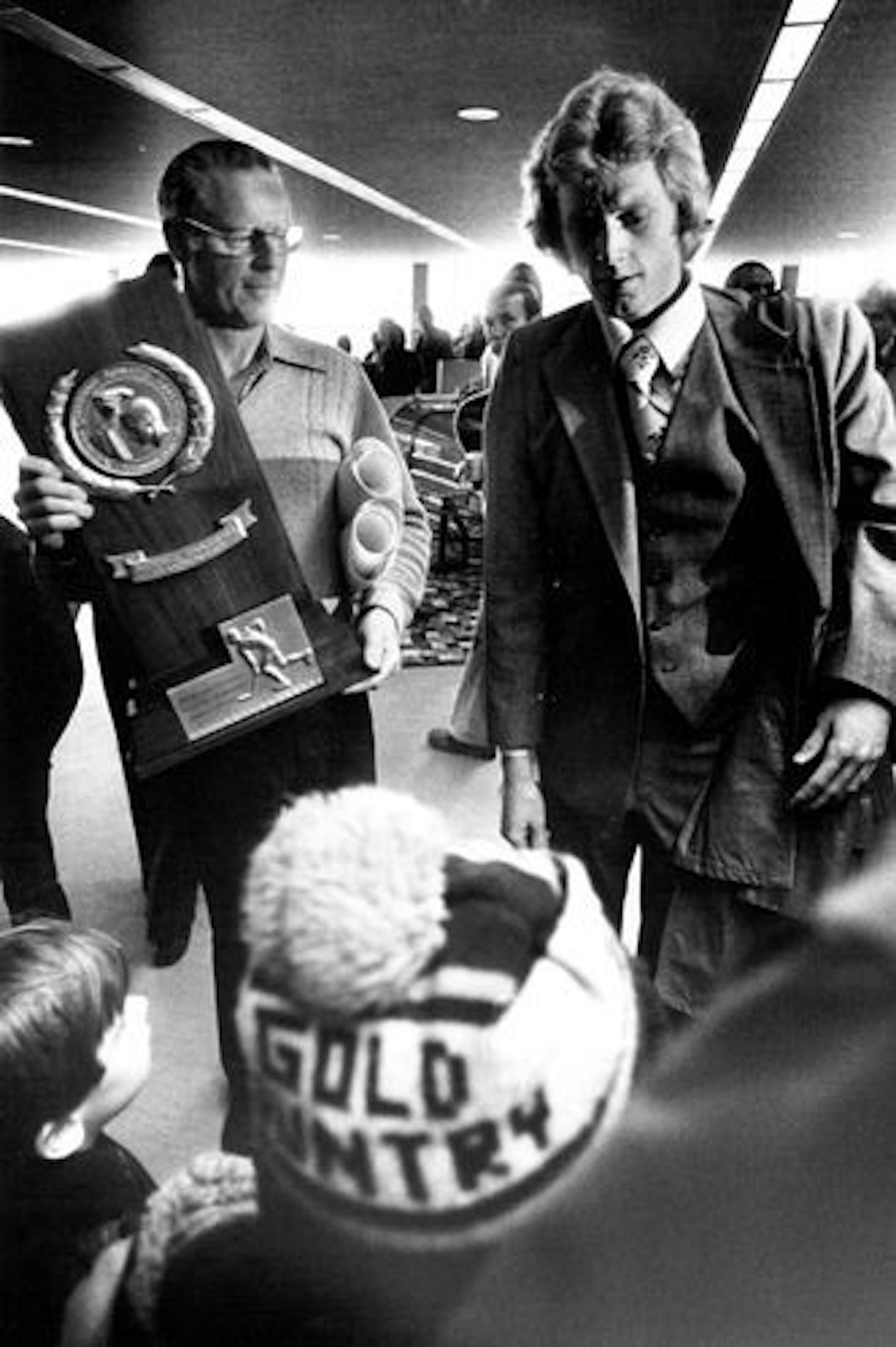 March 28, 1979 Bill Baker Sr., left, and Gopher captain Bill Baker Jr. brought home the NCAA hockey trophy after the University of Minnesota.   March 25, 1979  John Croft, Minneapolis Star Tribune
