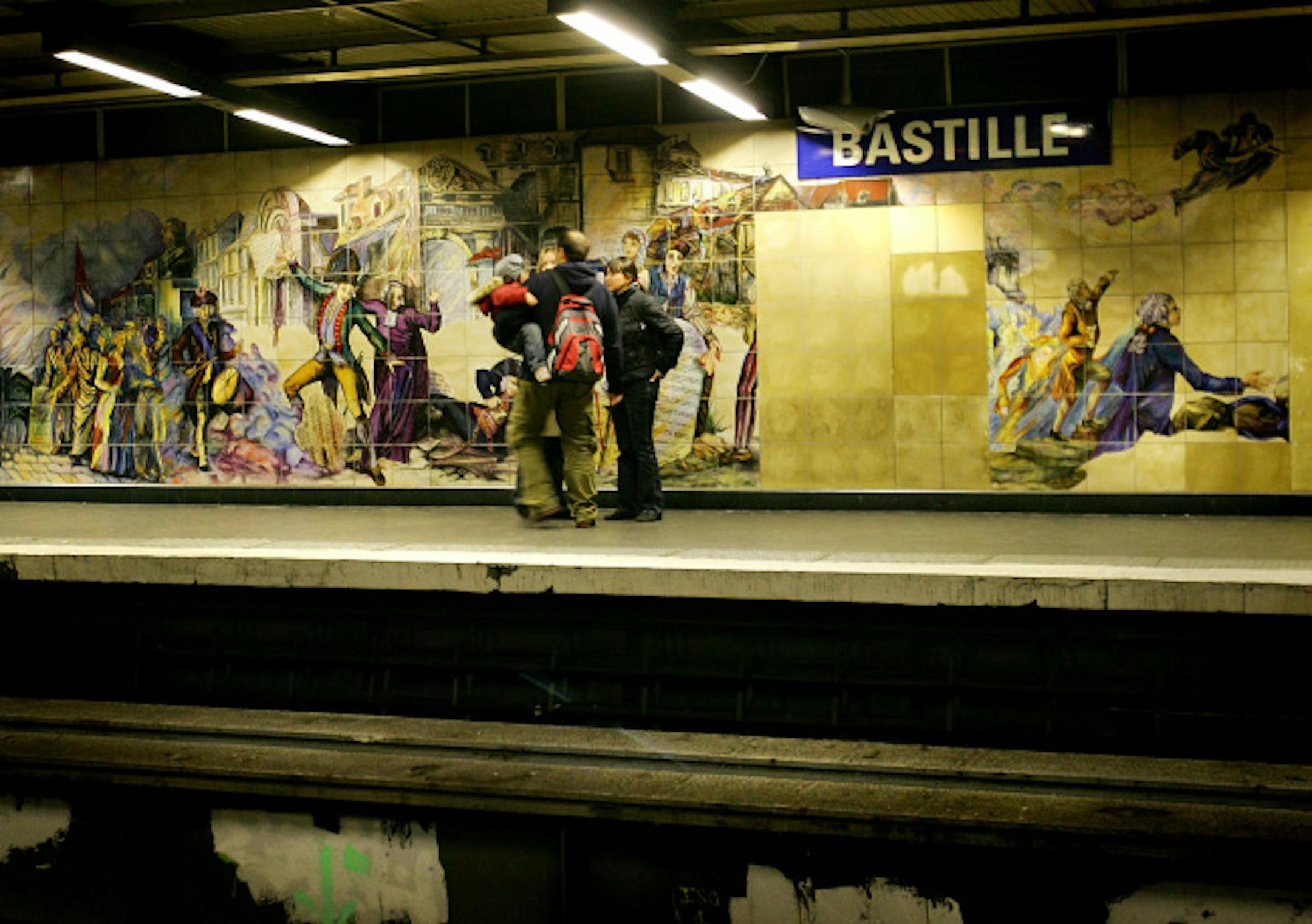 PARIS - OCTOBER 19: Passengers wait on the platform, for the metro at Bastille on October 19, 2007 in Paris.