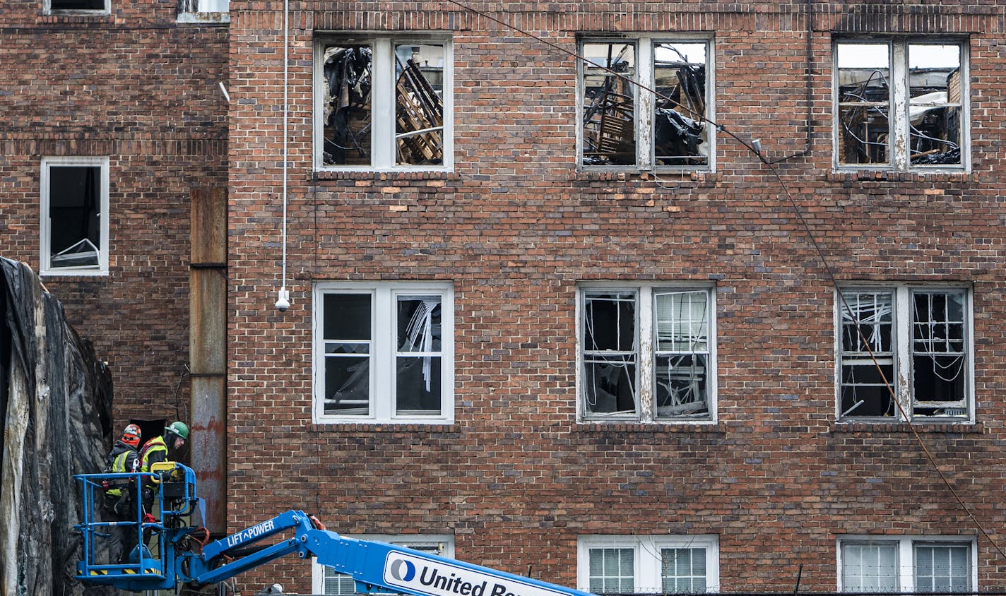 Careful demolition of the Francis Drake hotel has begun. Crew members used hazmat masks because of residue toxic fumes. ] RICHARD TSONG-TAATARII &#xa5; richard.tsong-taatarii@startribune.com ORG XMIT: MIN1912281202212199