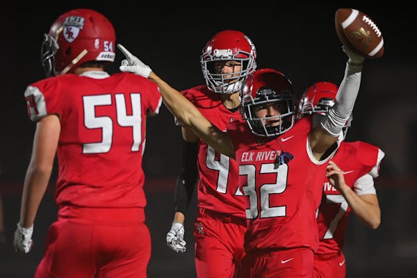 Elk River running back Tony Billman (32) celebrates his touchdown against Andover Friday, Sept. 9, 2022 during the second half of a football game at E