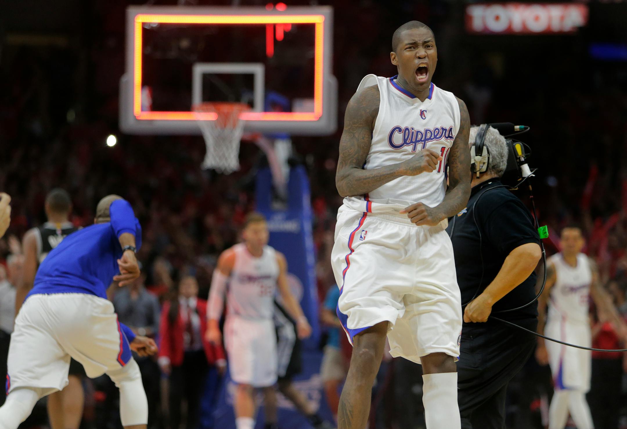 Jamal Crawford celebrates the Clippers' 111-109 win against the San Antonio Spurs in Game 7 of the Western Conference quarterfinals at Staples Center in Los Angeles on Saturday, May 2, 2015. (Gina Ferazzi/Los Angeles Times/TNS)