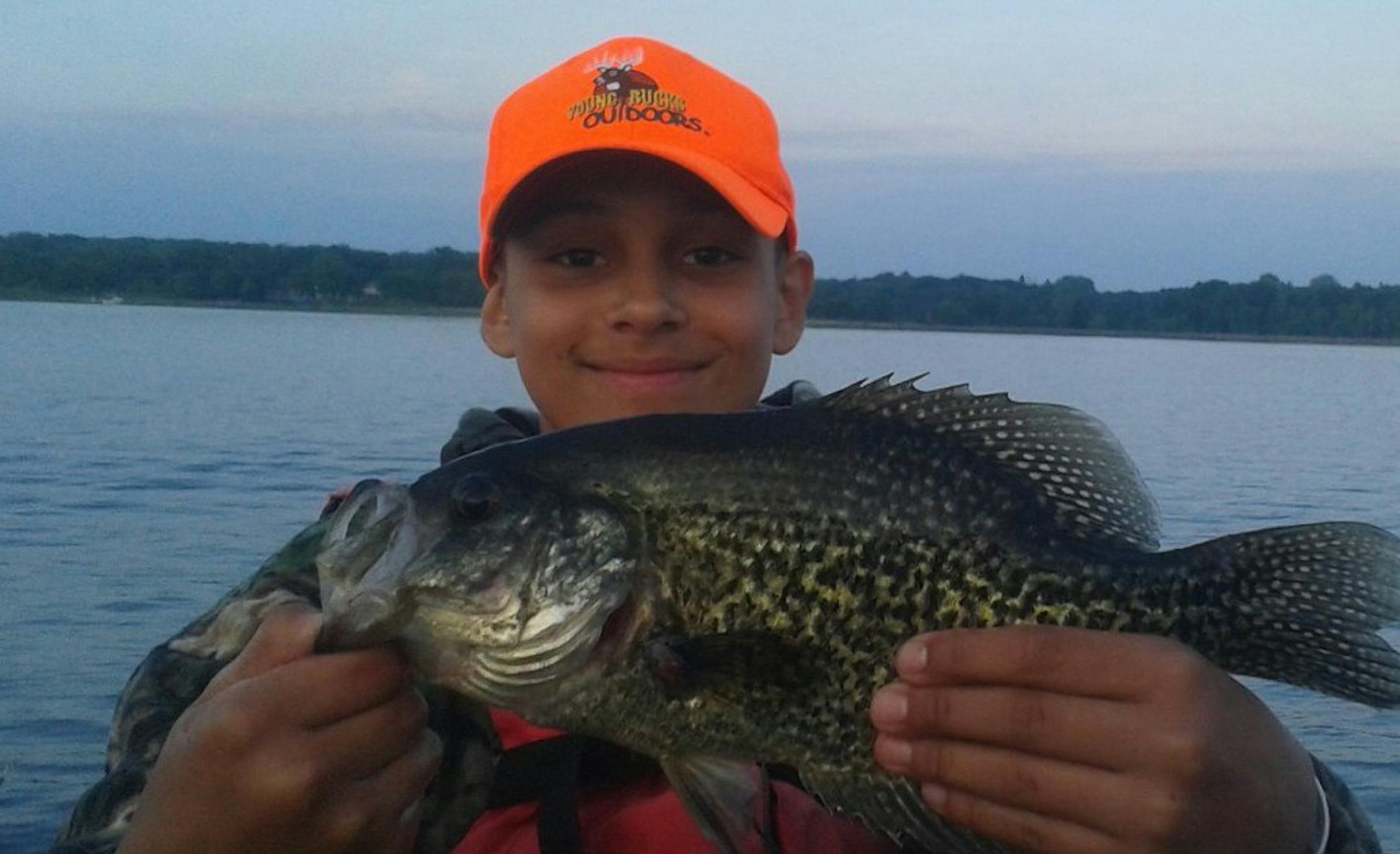 ONE BIG CRAPPIE Taj Hunter of Minneapolis was fishing with his Papa on Big Marine Lake using an X-Rap Rapala lure when Taj thought he had hooked a bass. Papa shouted "Taj, that's a crappie!" It measured 14 inches long.