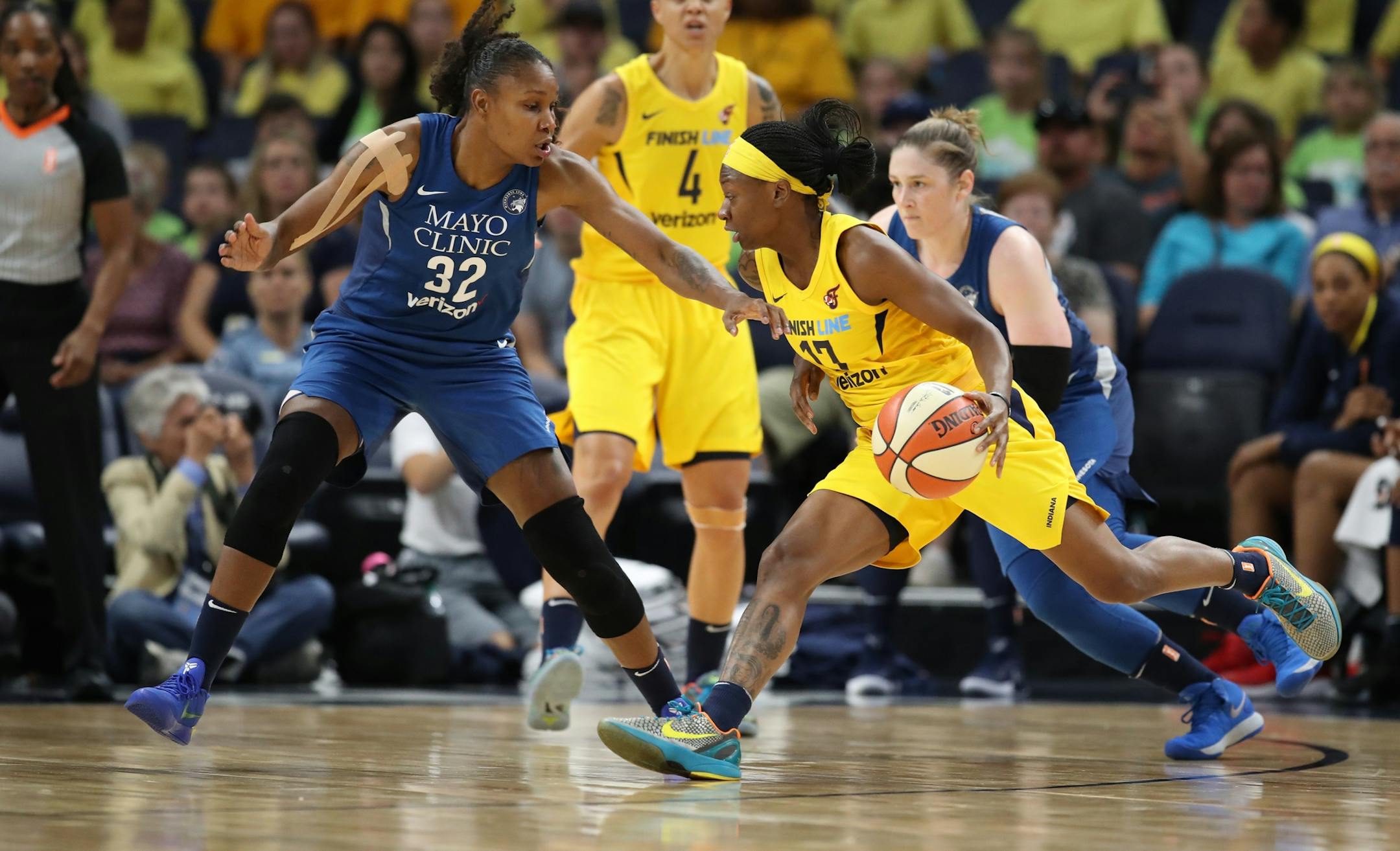 Lynx Rebekkah Brunson played defense on Fever Erica Wheeler at Target Center Wednesday July 18, 2018 in Minneapolis , MN.