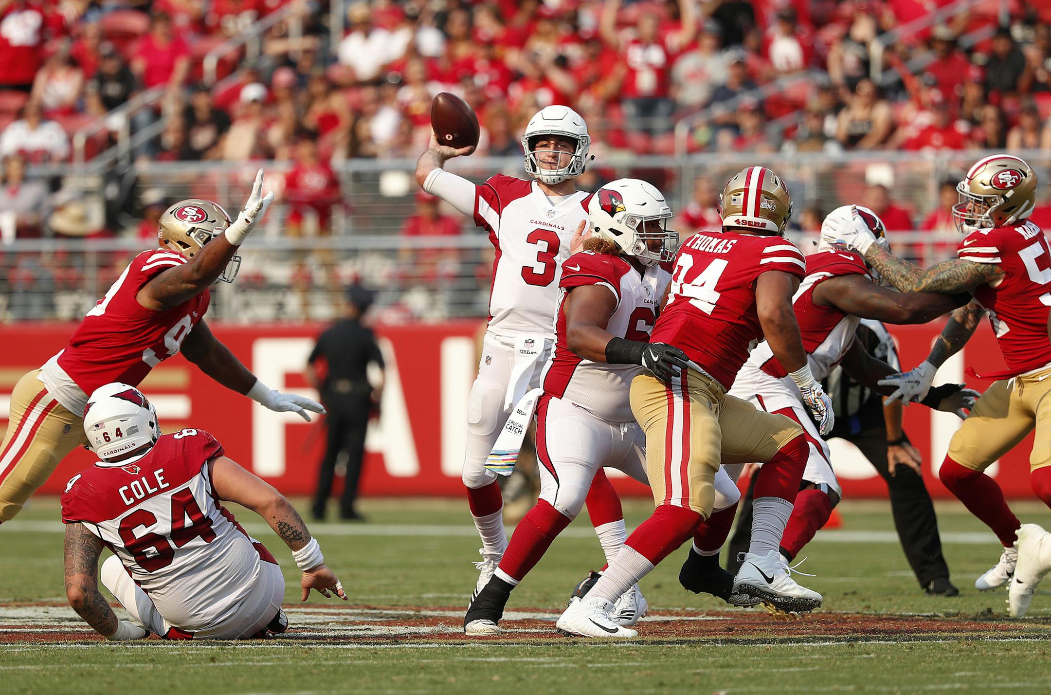 Arizona Cardinals quarterback Josh Rosen (3) passes against the San Francisco 49ers during the second half of an NFL football game in Santa Clara, Calif., Sunday, Oct. 7, 2018. (AP Photo/Tony Avelar)