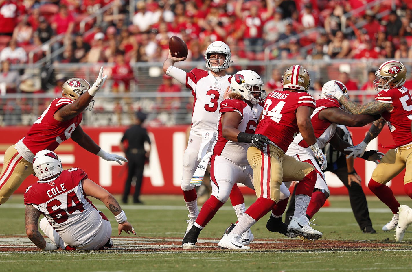 Arizona Cardinals quarterback Josh Rosen (3) passes against the San Francisco 49ers during the second half of an NFL football game in Santa Clara, Calif., Sunday, Oct. 7, 2018. (AP Photo/Tony Avelar)