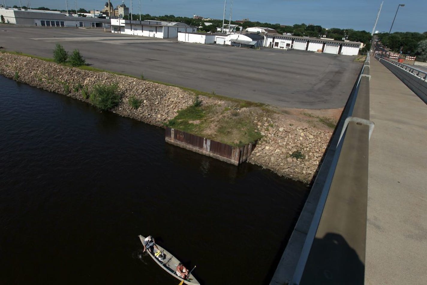 The view from the Plymouth Avenue Bridge of a former lumberyard purchased by the Minneapolis Park system. The site of a future riverfront park contains lead, arsenic, petroleum and other compounds in its soil. Cleaning up the pollution will require more than $1 million, in addition to the $7.7 million paid to purchase the property in 2010.