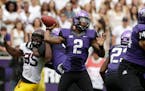 TCU quarterback Trevone Boykin (2) passes the ball as Minnesota defensive lineman Hank Ekpe (95) is blocked when the Gophers and Horned Frogs played i