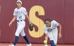 Champlin Park’s Layla Nguyen warms up Friday as her team prepares to take on Bloomington Jefferson in the Class 4A softball state championship game