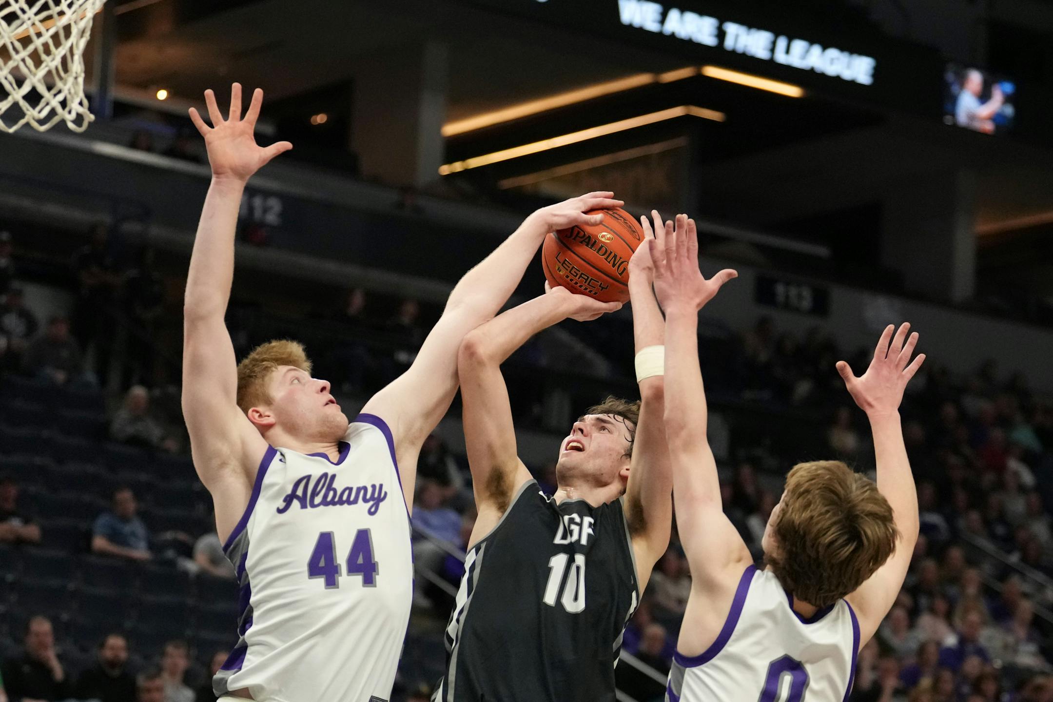 DGF guard Owen Leach (10) goes up for a shot as Albany center Ethan Borgerding (44) and guard Zeke Austin (0) defend in the second half.