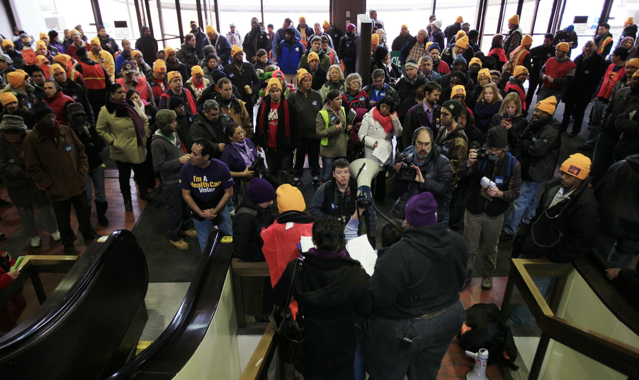 Janitors and security officers rallied last month at the Hennepin County Government Center.