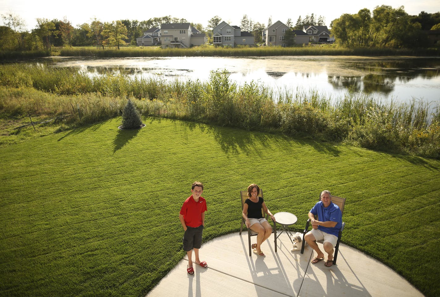 Shannon and George Janssen and their son, David, on the patio behind their home in the new development the Preserve at Lino Lakes Monday evening in Lino Lakes. ] JEFF WHEELER &#xef; jeff.wheeler@startribune.com There are 1,235 new homes on the drawing board for Lino Lakes. That could add nearly 4,000 new people to the city of 20,000 on Anoka County's southern border. George and Shannon Janssen are among an eager wave of newcomers moving into homes on woodsy lots in the new developments. They wer