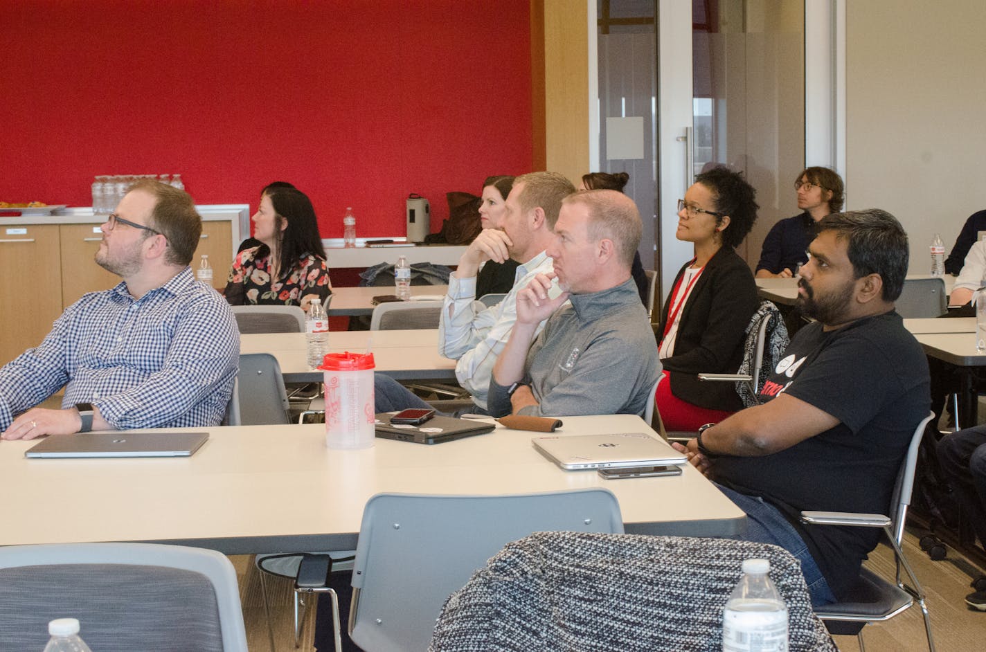 University of Minnesota students and Target leaders at Target's Brooklyn Park campus listen to student presentations for a U capstone course. (Provided by Target)