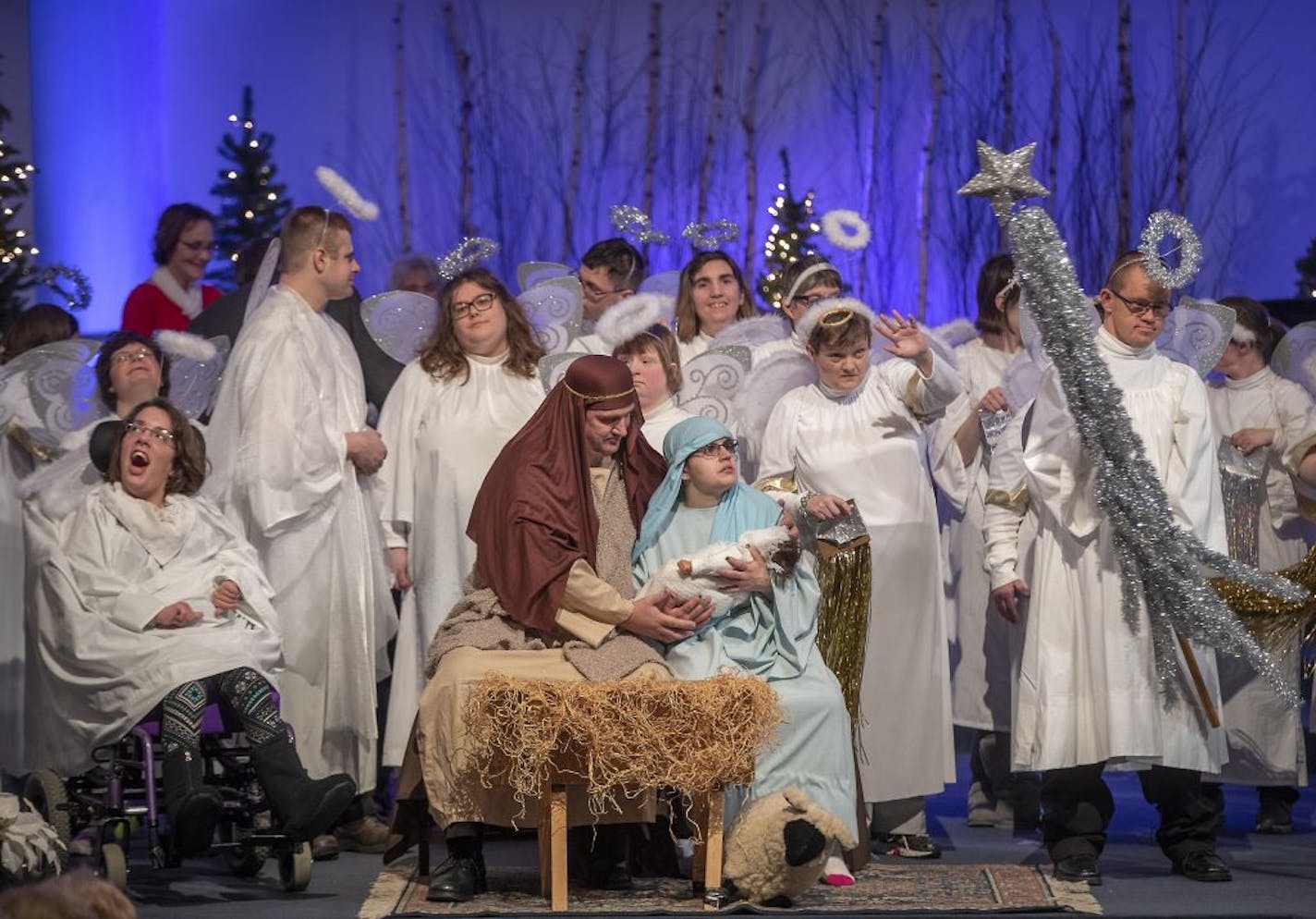 Surrounded by angels, Fred Alexander, left, performing the role as Joseph, and Amy Nelson, who has waited for years to play "Mary's role," performed "Joy to the World" during the nativity pageant at Meadow Creek Church, Thursday, November 29, 2018 in Andover, MN.