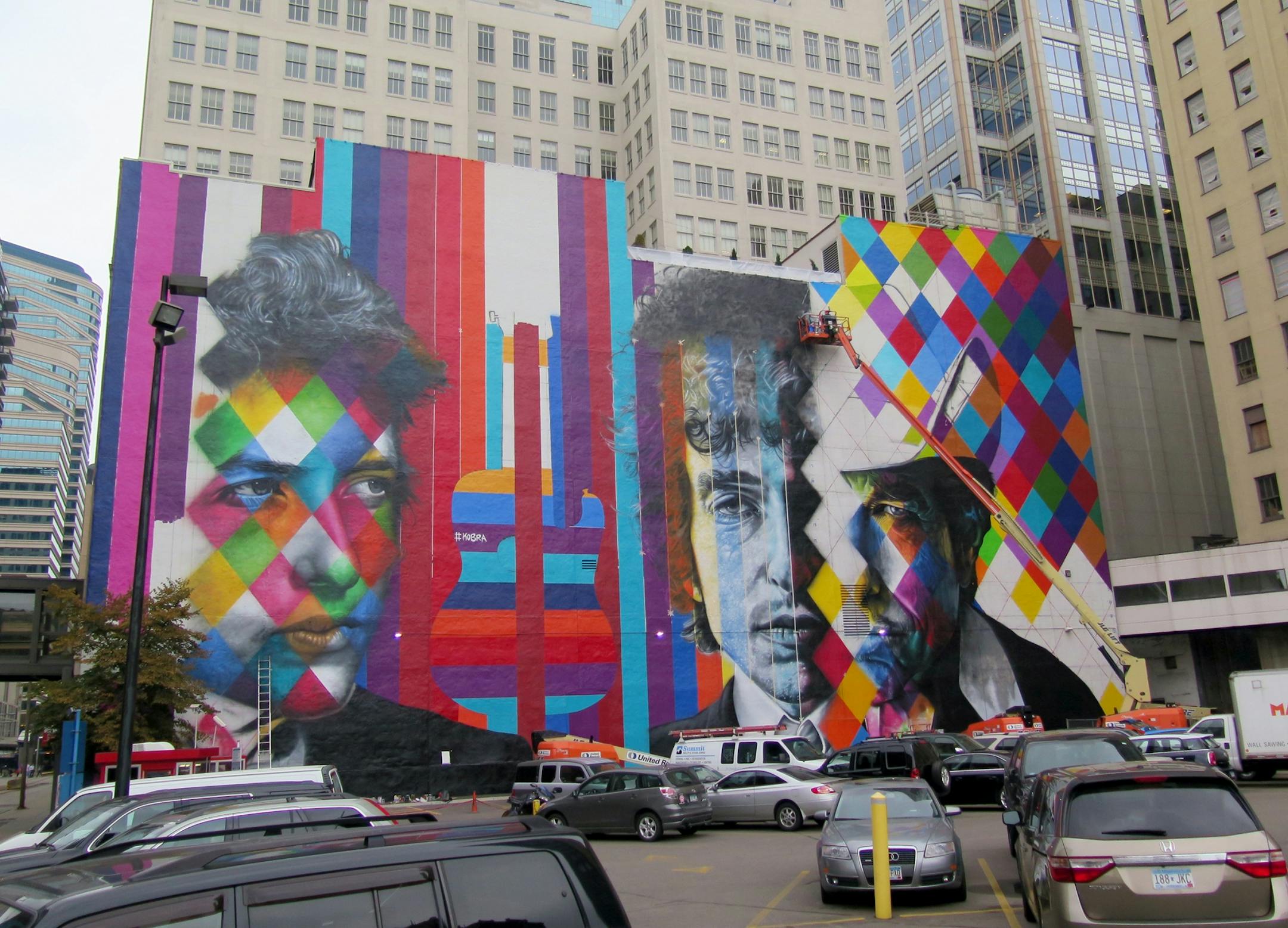 The blank white wall facing the corner of 5th and Hennipen Av has become the 'canvas' for a mural by Brazillian artist Kobra- with multiple images of Bob Dylan. Photo taken 09/02.