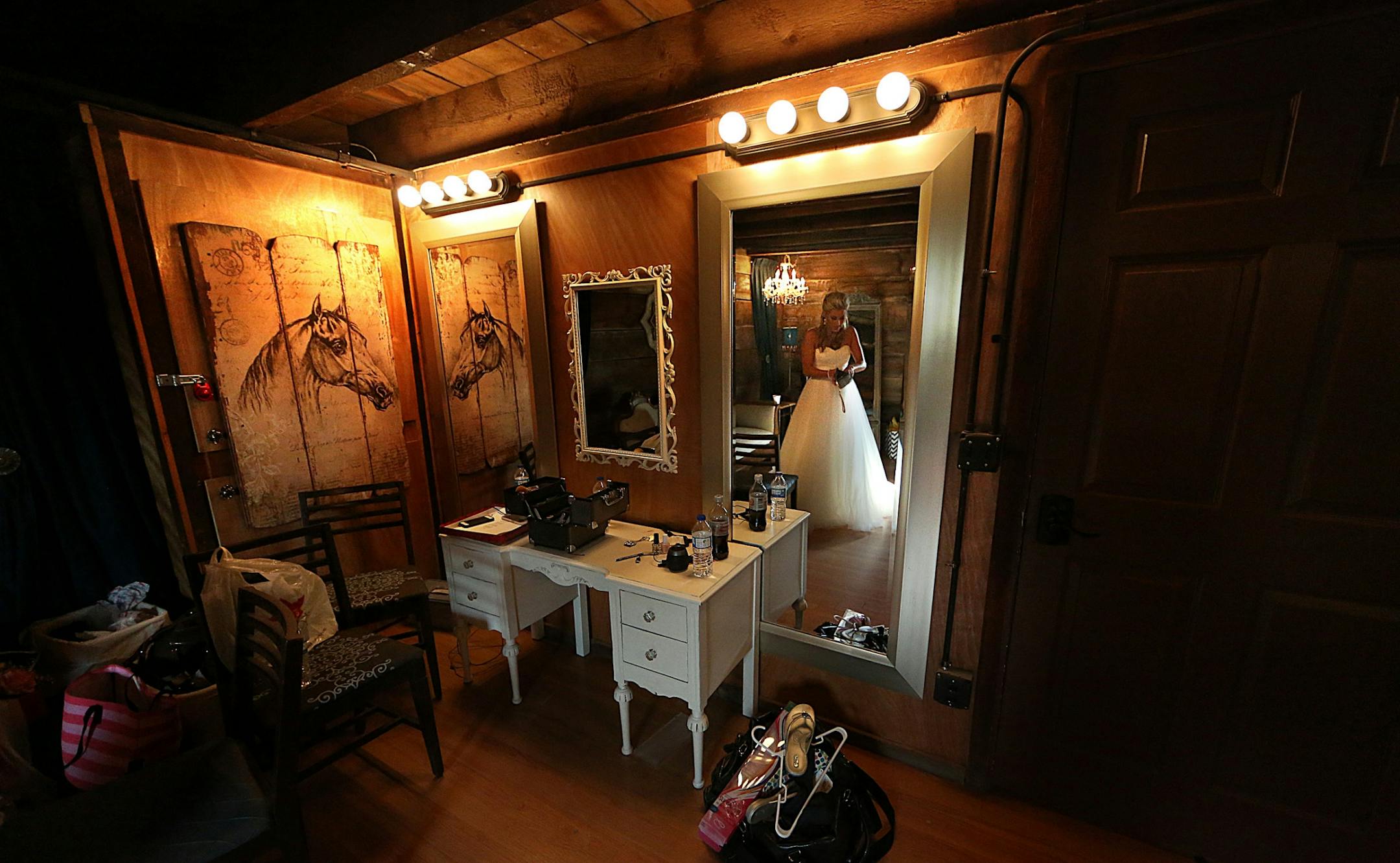 Bride Savannah Koehnen waited in a dressing room at Hope Glen Farm, just moments before she was to join her father, Gary Koehnen, to walk up the aisle. The groom was Jeremy Eckert.