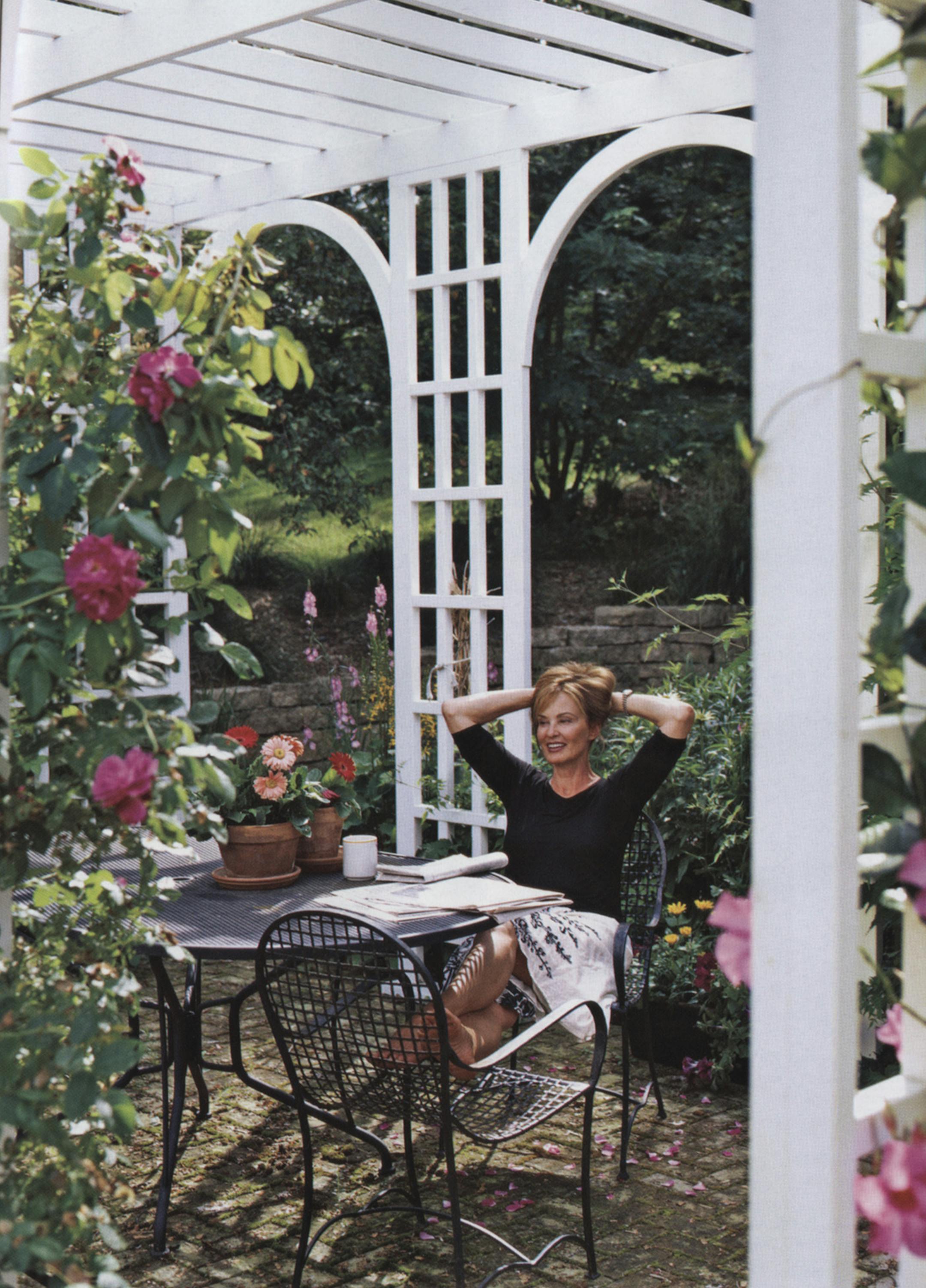 Jessica Lange in the garden of her Stillwater home for the March 2006 issue of Architectural Digest magazine.
