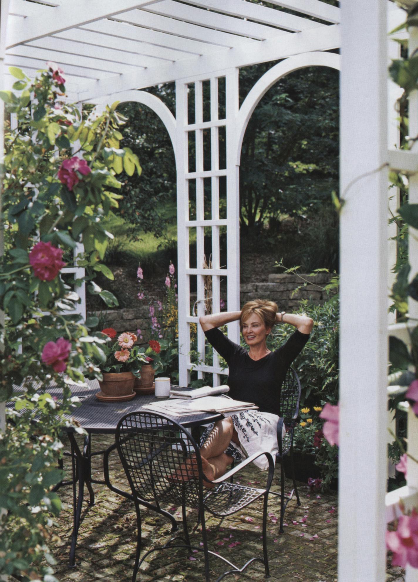 Jessica Lange in the garden of her Stillwater home for the March 2006 issue of Architectural Digest magazine.