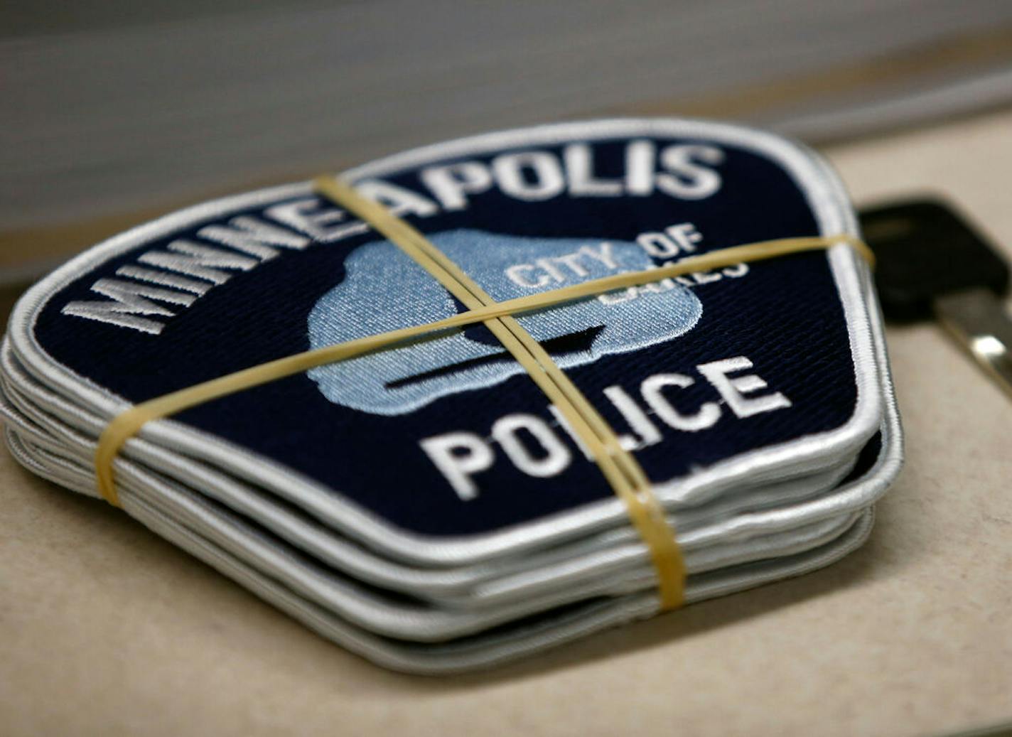 In North Minneapolis the first day of police training academy is being set in motion with the latest crop of cadets, 27. Minneapolis Sgt. Each cadet gets a set of eight badges.] Richard Tsong-Taatarii/rtsong-taatarii@startribune.com