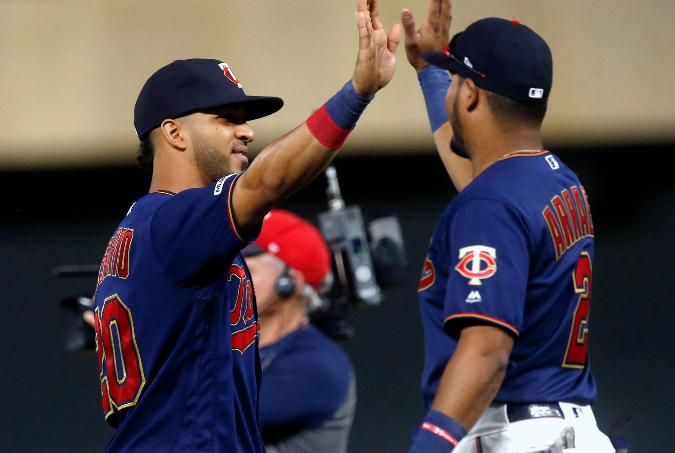 Eddie Rosario, left, celebrated with Luis Arraez after the Twins beat the Tampa Bay Rays 9-4 at Target Field on Tuesday night. Rosario went 4-for-5 with two RBI.