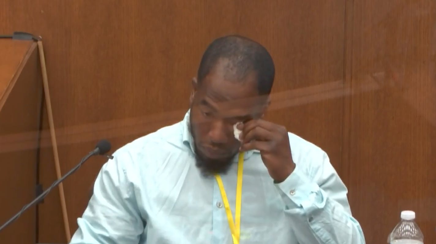 In this image from video, witness Donald Williams wipes his eyes as he answers questions, as Hennepin County Judge Peter&nbsp;Cahill presides Tuesday, March 30, 2021, in the trial of former Minneapolis police officer Derek Chauvin at the Hennepin County Courthouse in Minneapolis, Minn. Chauvin is charged in the May 25, 2020 death of George Floyd. (Court TV via AP, Pool)