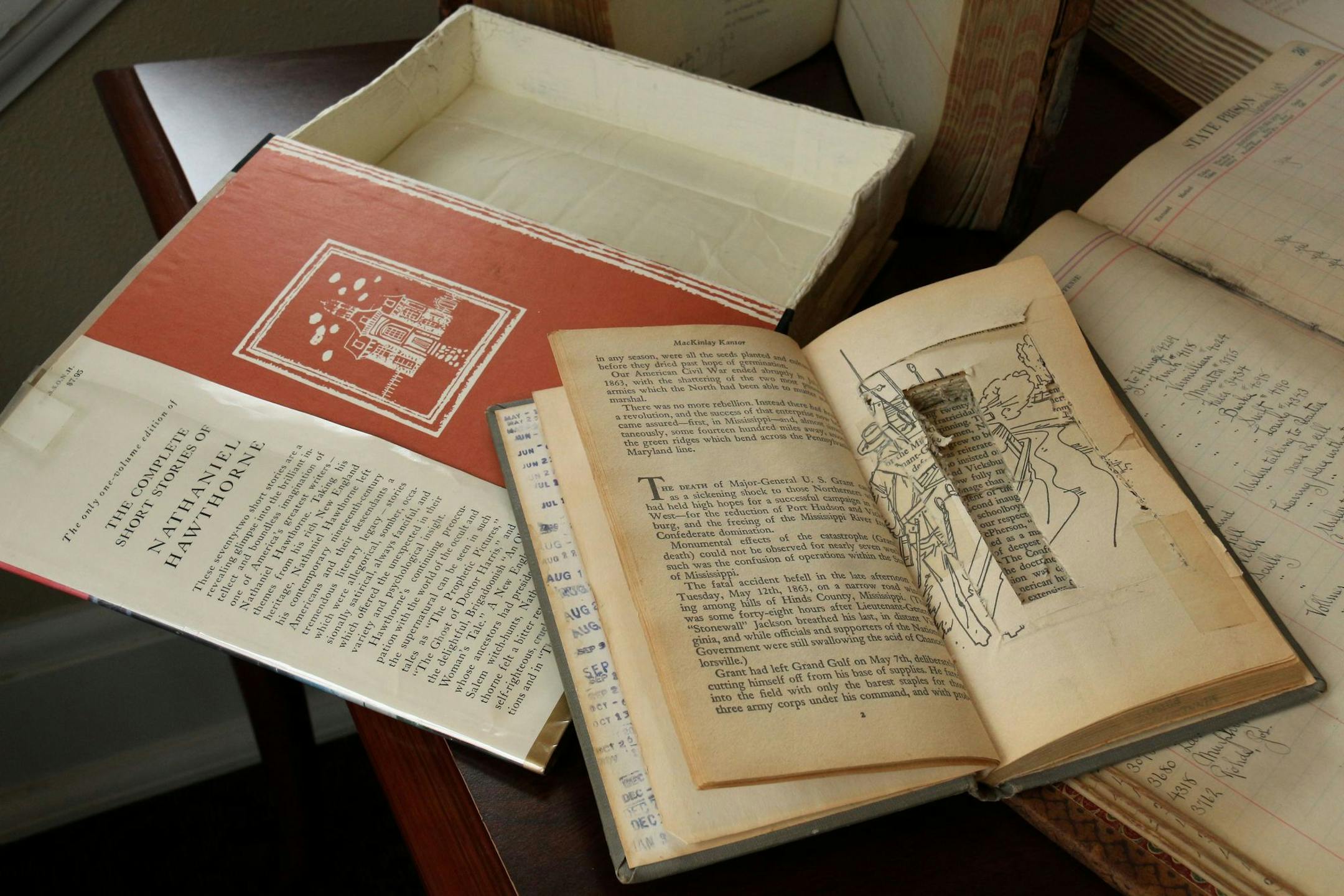 Displays at Stillwater prison showed books modified to hide weapons and other contraband.