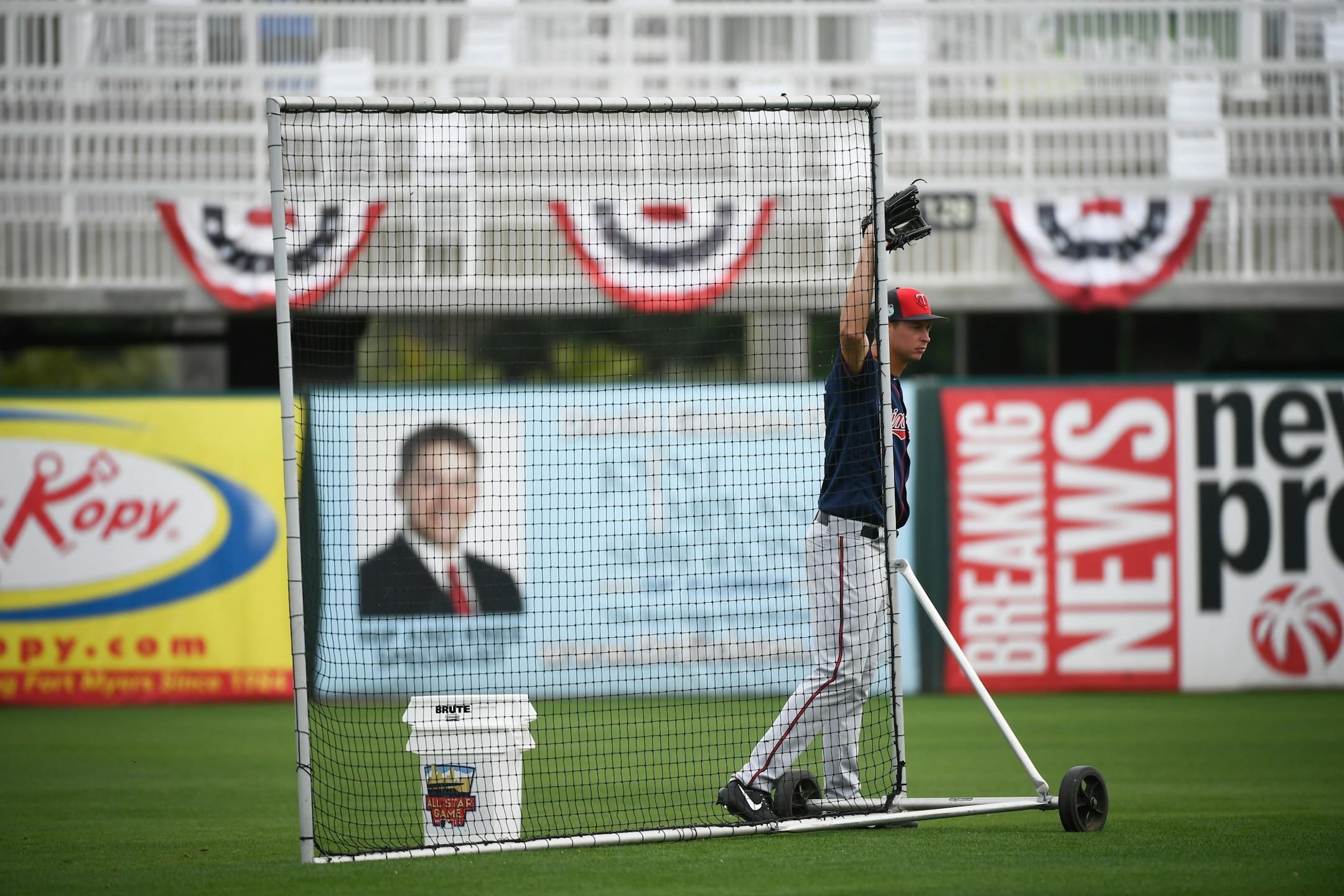Minnesota Twins pitcher Stephen Gonsalves (67) rested against protective netting while fielding balls during batting practice Tuesday.