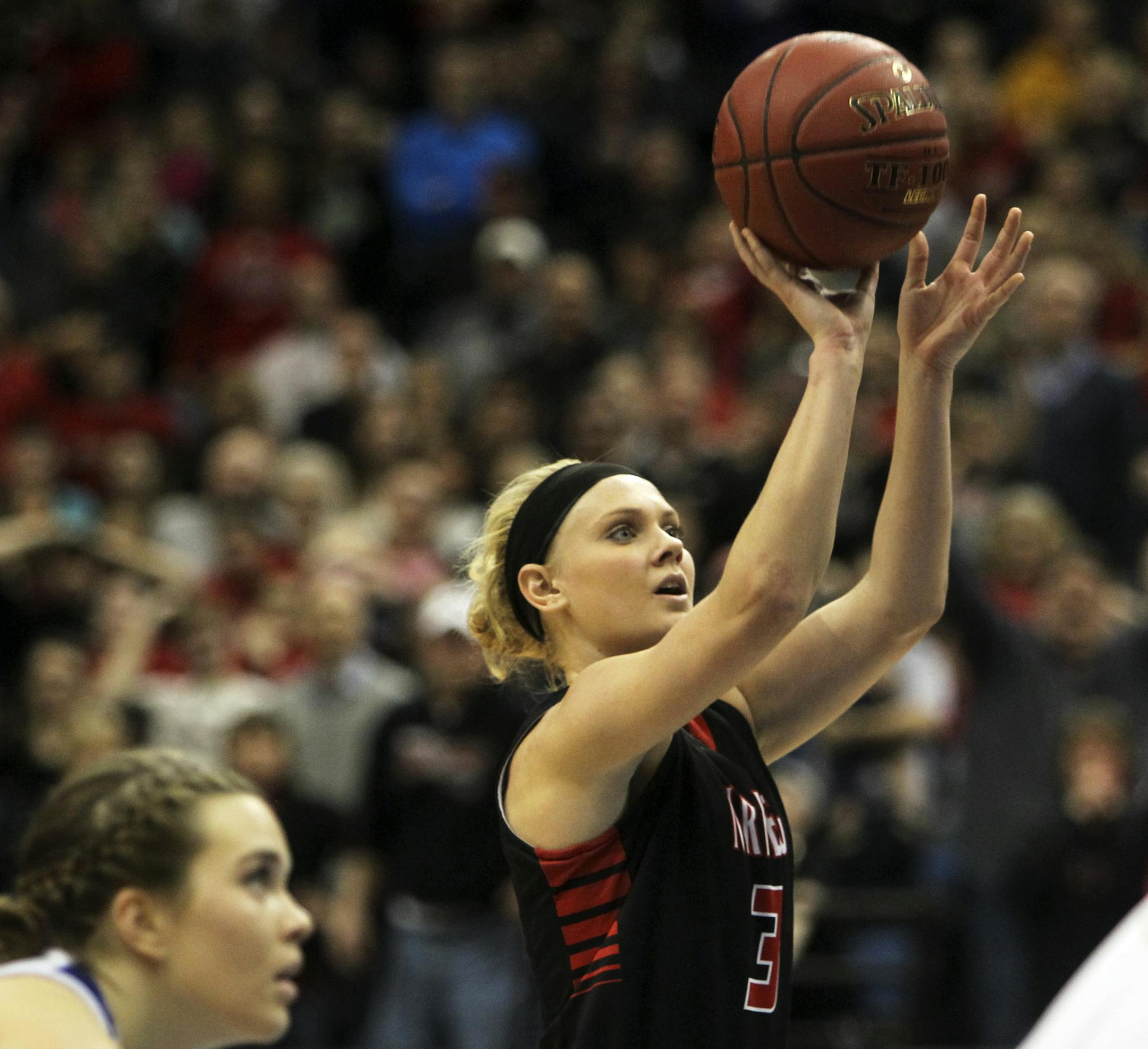 New Richland-H-E-G's Carlie Wagner releases a free throw, making her 50th point and beating her own single game state record from last year during her team's dramatic 60-59 win over Braham during the girls basketball state tournament (class 2A) finals Saturday, March 16, 2013, at the Target Center in Minneapolis. ] (DAVID JOLES/STARTRIBUNE) djoles@startribune.com girls basketball state tournament (class 2A) finals Saturday, March 16, 2013, at the Target Center in Minneapolis.**Carlie Wagner,cq