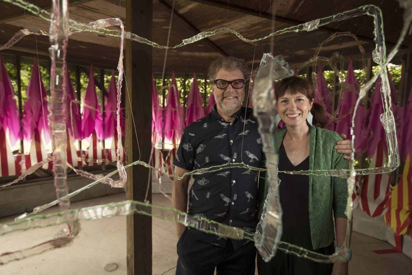 David Hamlow and his wife Liz Miller unveiled an art installation on the grounds of the Kirkbride were they transformed one the gazebos into a funhouse of color, movement and art Wednesday June 28, in Fergus Falls, MN.