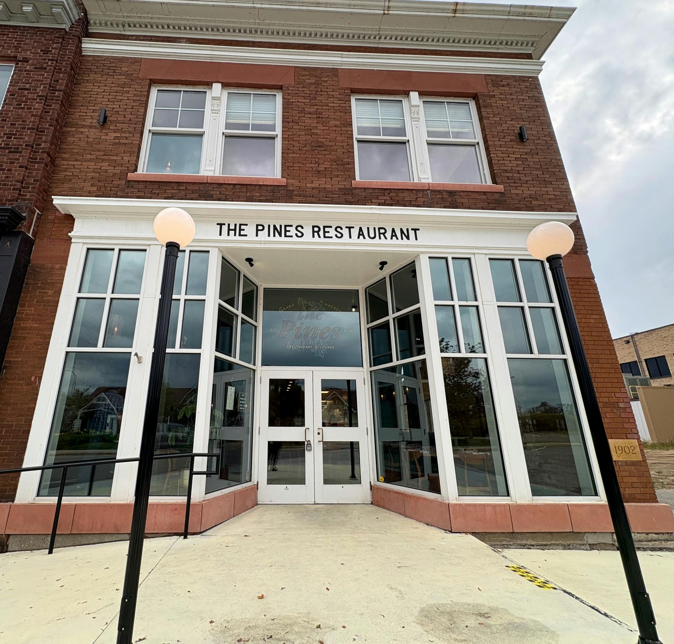 Exterior of the Pines, a historic brick building in downtown Grand Rapids.