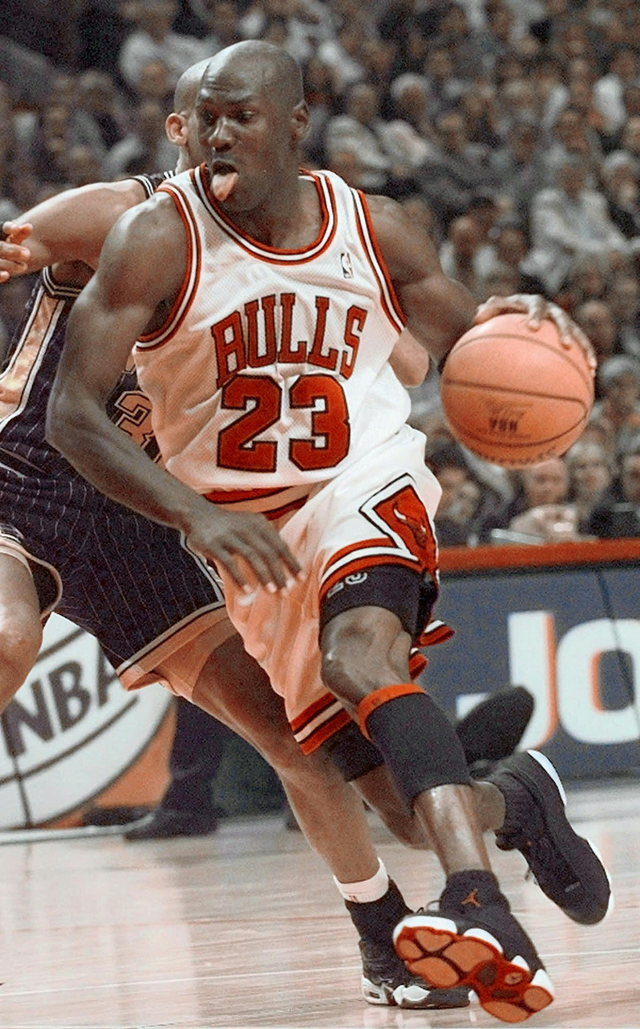 Chicago Bulls' Michael Jordan drives past Indiana Pacers' Reggie Miller during Game 5 of the Eastern Conference Finals Wednesday, May 27, 1998, in Chicago. Jordan was high-point man with 29 points, his last one the 35,000th of his career, including regular season and playoffs. The Bulls defeated the Pacers 106-87 to take a 3-2 lead in the series.(AP Photo/Beth A. Keiser) ORG XMIT: CXA104,CXA104