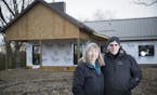 Carol and Tom Insley are building Granite House, a residence for young people living with severe and permanent brain injuries. The posed for a photo a