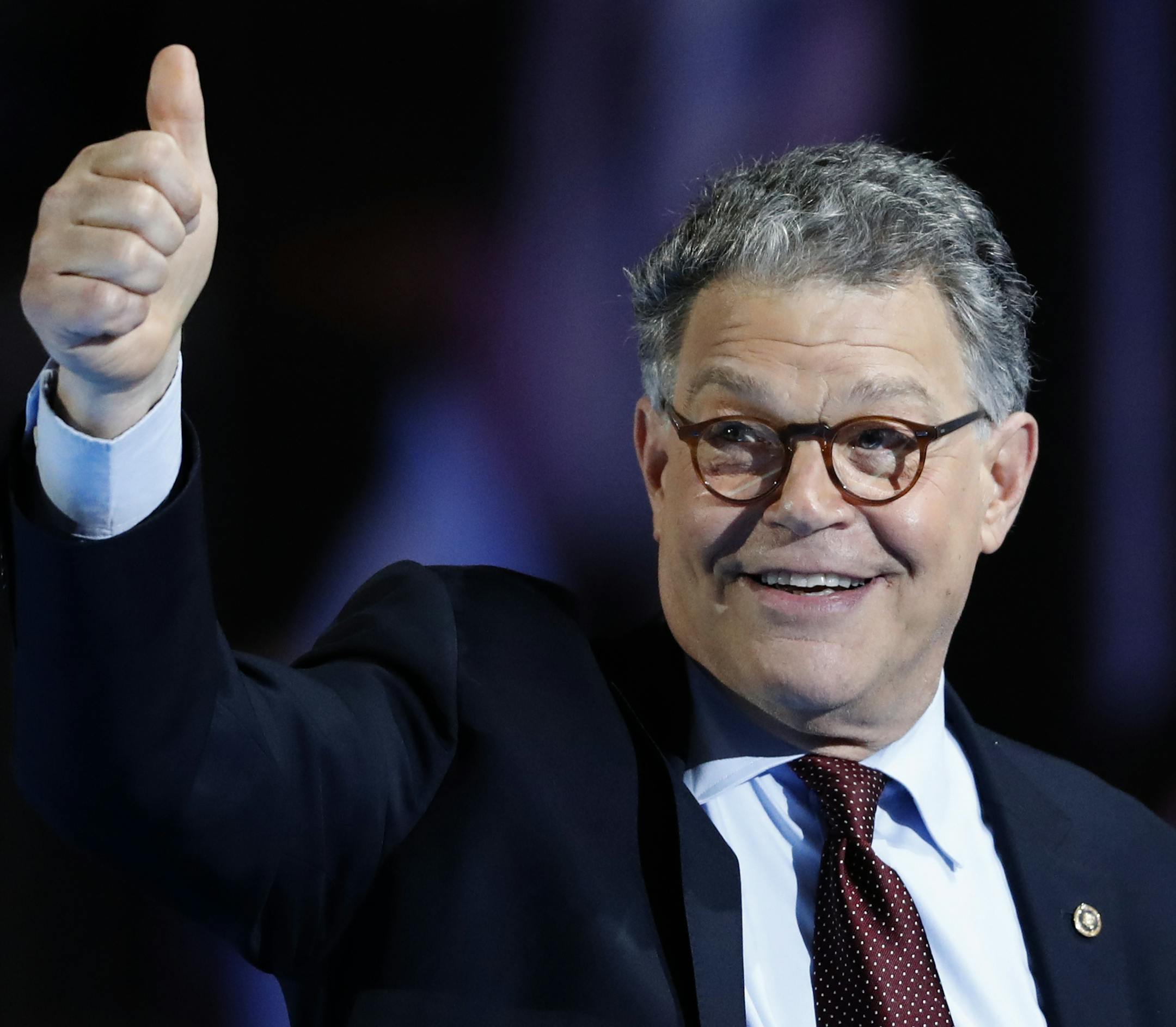 Sen. Al Franken, D-Minn. gestures as he leave the stage after speaking during the first day of the Democratic National Convention in Philadelphia , Monday, July 25, 2016. (AP Photo/Paul Sancya)
