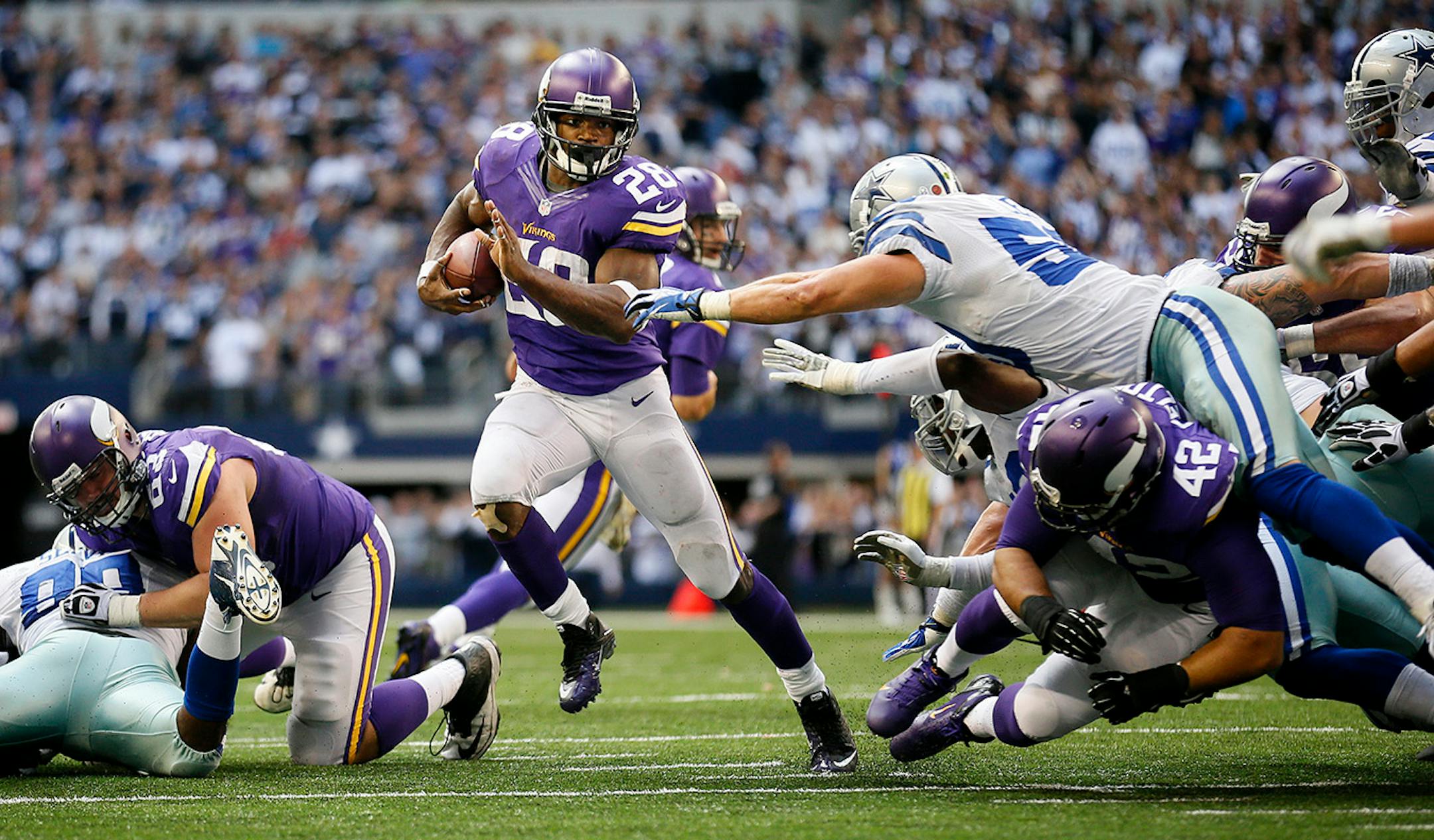 Adrian Peterson found a hole and then bulldozed his way to the goal line on an 11-yard touchdown run in the 4th quarter.