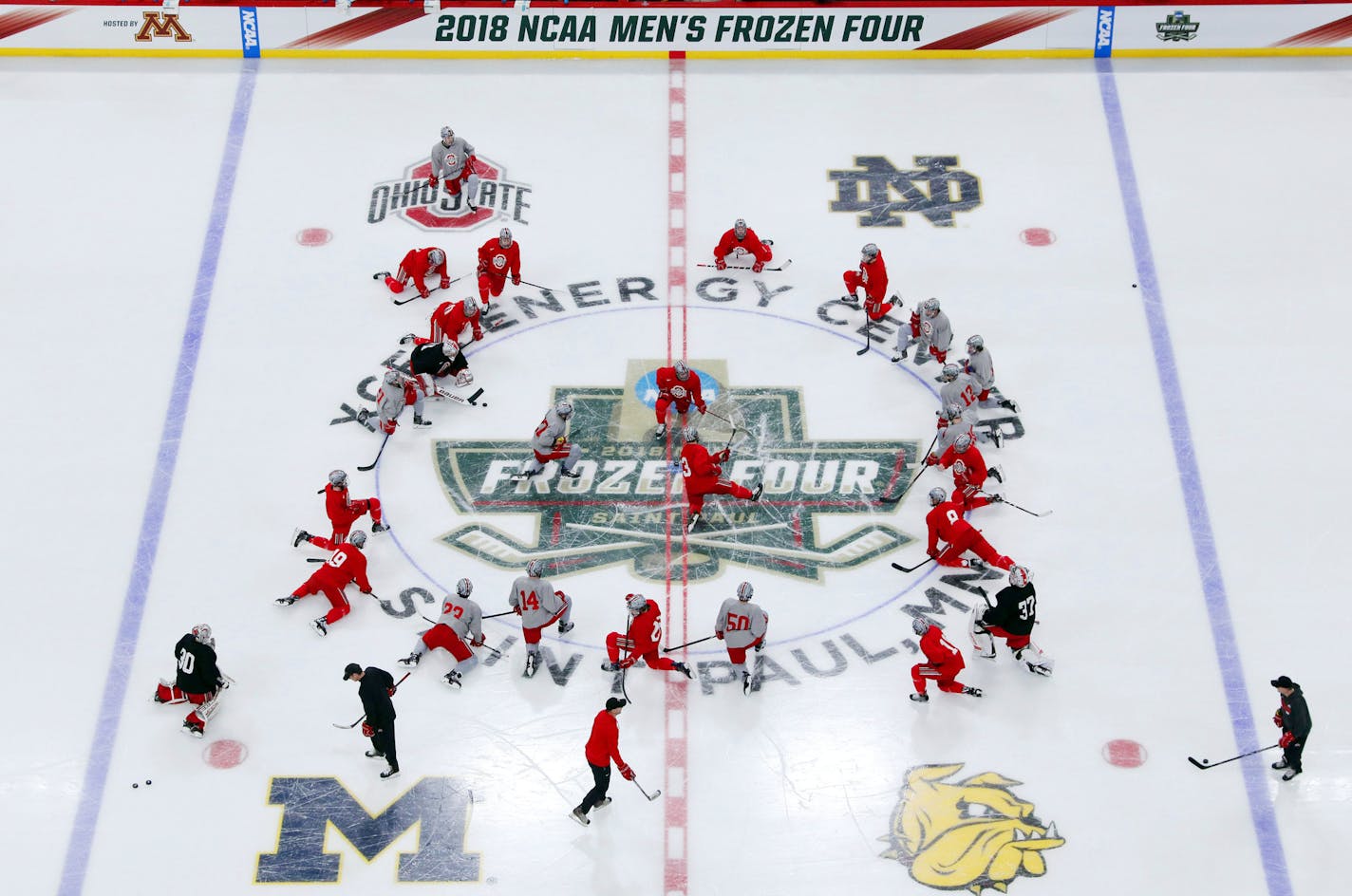 Ohio State players stretched together during practice Wednesday afternoon. ] ANTHONY SOUFFLE &#xef; anthony.souffle@startribune.com The teams in this year's Frozen Four NCAA hockey tournament, Minnesota Duluth, Ohio State, Notre Dame, and Michigan practiced ahead of this week's games Wednesday, April 4, 2018 at the Xcel Energy Center in St. Paul.