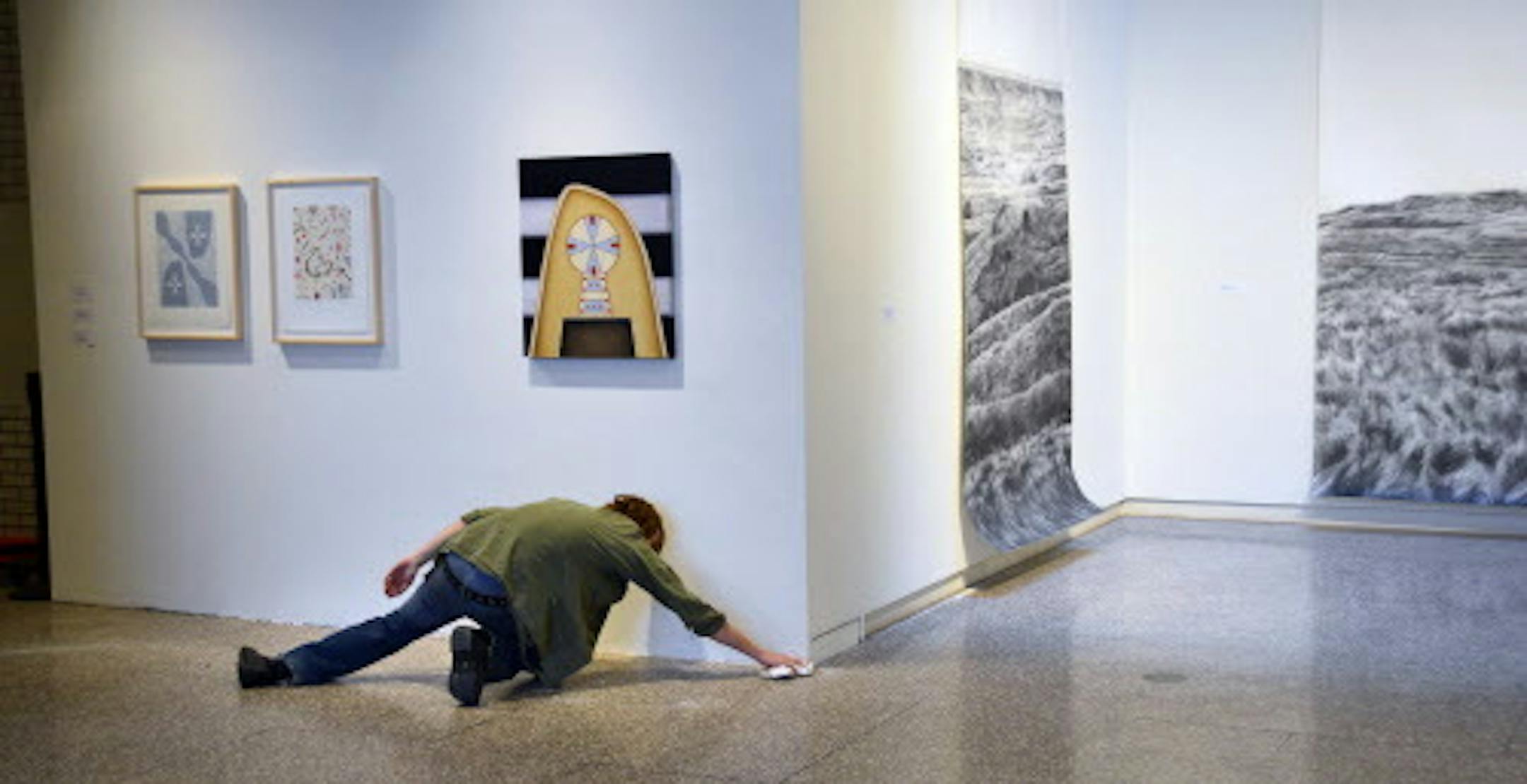 Last minute touches were being done getting the McKnight Artists Exhibition ready at the Minneapolis College of Art and Design gallery   .McKnight Artists Exhibition Program has run for past 32 years, The $25,000 grants will continue and go to 8, rather than 4, artists including photographers who previously had a dedicated program. Instead of exhibitions, program will now have public talks between artists and outside critics plus production of an artist book for each grantee. Artists in this final exhibition are Catherine Meier, Joe Sinness, Amy Toscani and Dyani White Hawk. ] Richard.Sennott@startribune.com Richard Sennott/Star Tribune St Paul Minn. Friday 1/10/2014)  **    (cq)