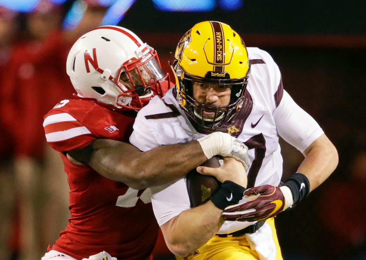 Mitch Leidner is tackled by Nebraska linebacker Michael Rose-Ivey during the second half last season. Plans are in the works for the Gophers and Cornhuskers to play on Black Friday in 2020-21