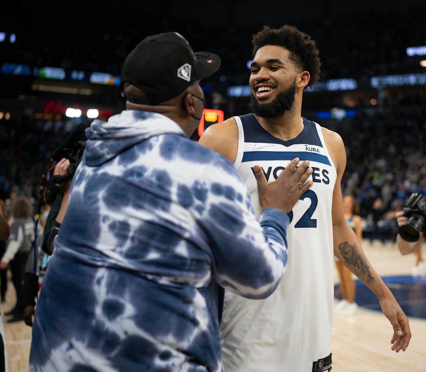 Minnesota Timberwolves center Karl-Anthony Towns (32) was congratulated by his father, Karl Townes Sr., after his 33 point contribution Saturday night, April 23, 2022 at Target Center in Minneapolis. The Minnesota Timberwolves defeated the Memphis Grizzlies 119-118 in game 4 of their NBA first round playoff series. ] JEFF WHEELER • Jeff.Wheeler@startribune.com