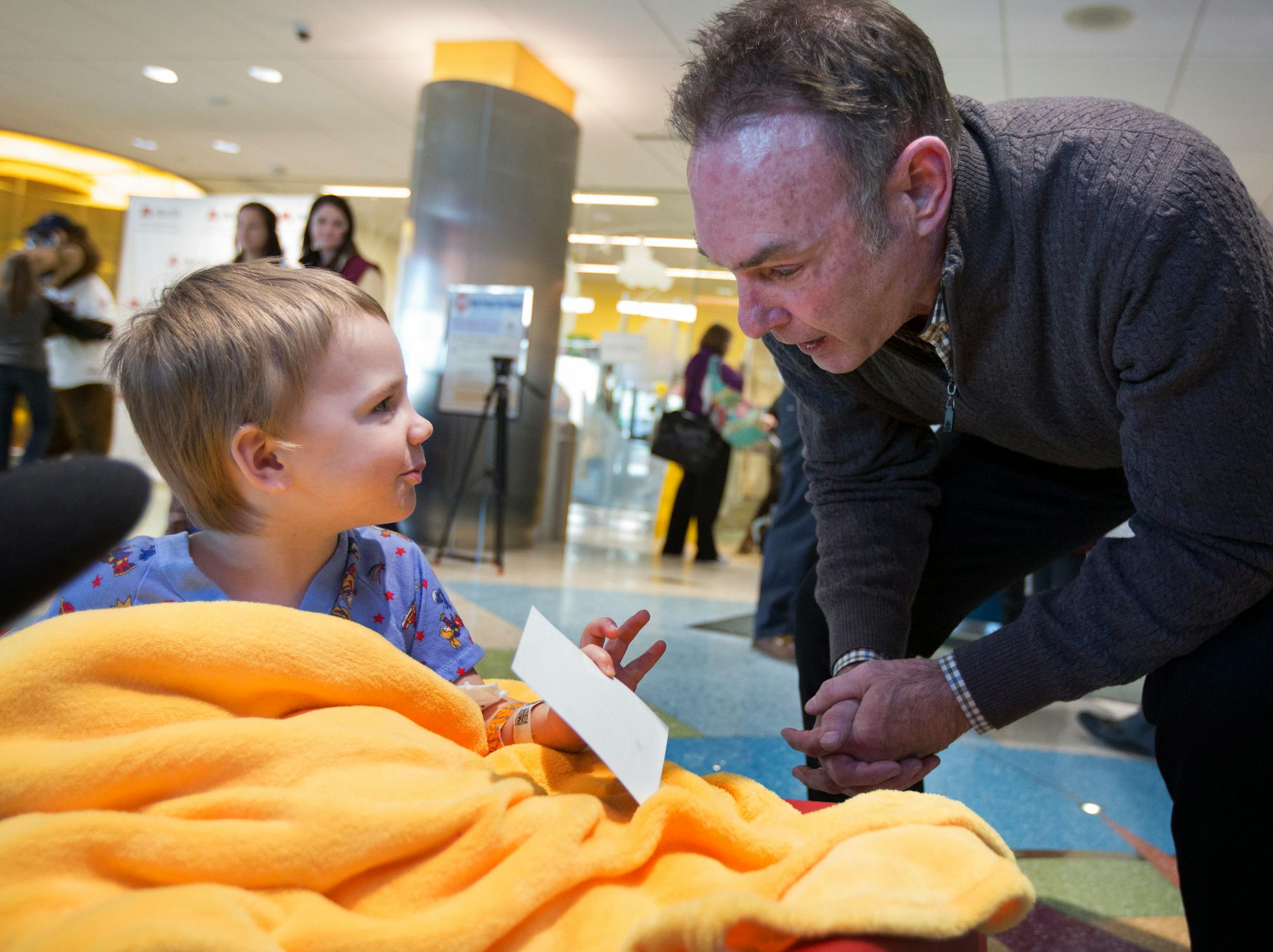 Twins Caravan kicked off Monday with new manager Paul Molitor on one of the first stops at the U of M Masonic Hospital. Here, Molitor offers an autographed picture to 3-year-old Decklan Hornstien of Rush City who seemed pleased. ( Twins Broadcaster Kris Atteberry, Pitcher Glen Perkins and 3rd Base Coach Joe Vavra visiting as well.) ] BRIAN PETERSON • brianp@startribune.com Minneapolis, MN - 12/10/2012