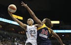Maya Moore went up for a layup against the Fever's Tamika Catchings in 2012.