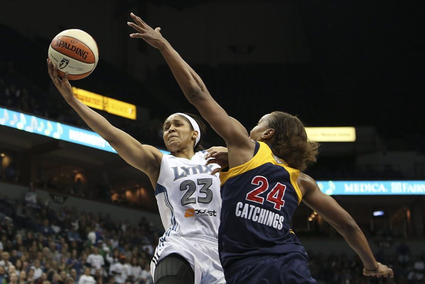 Maya Moore went up for a layup against the Fever's Tamika Catchings in 2012.