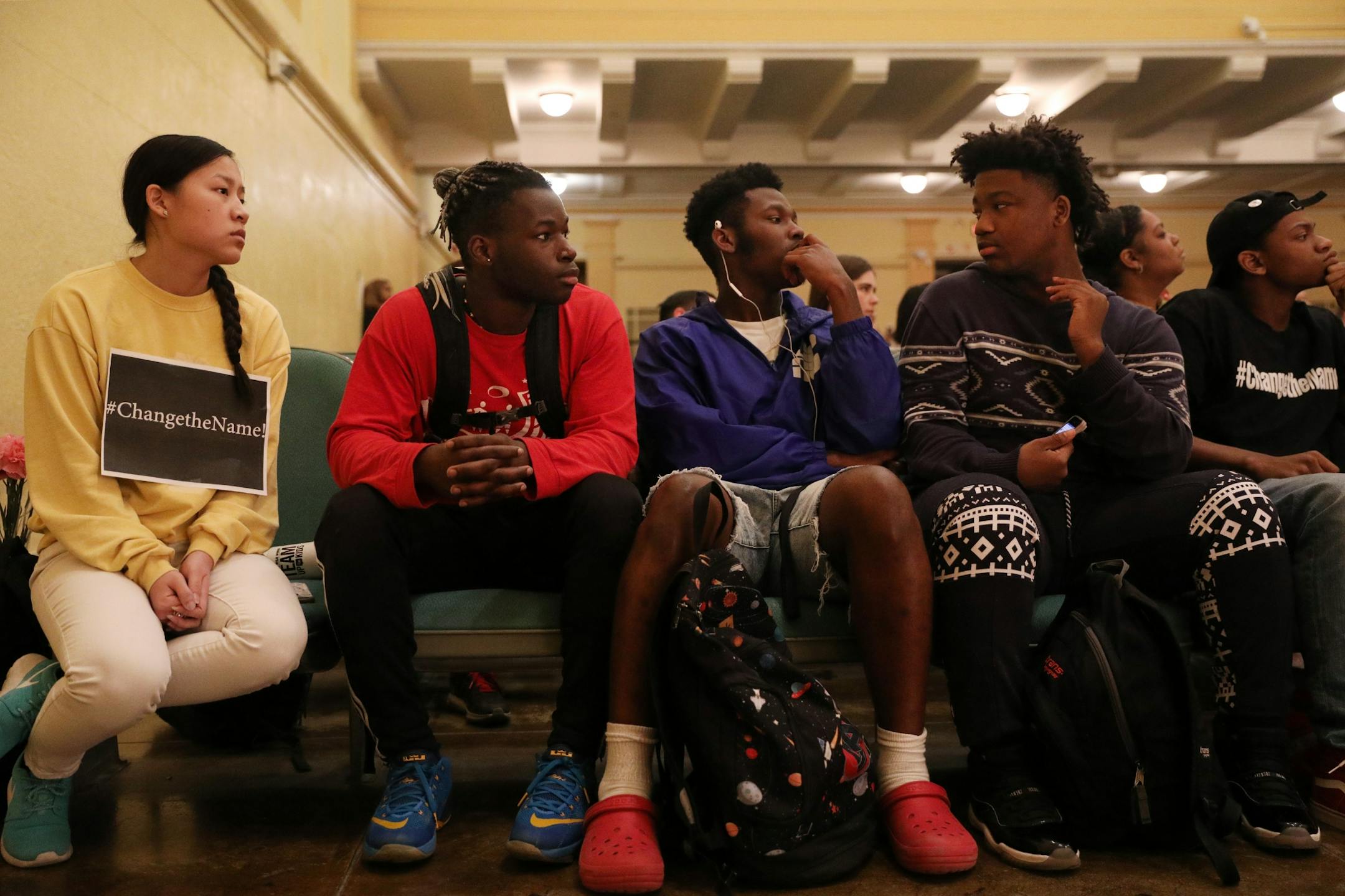 Patrick Henry High School seniors, from left, Christina Vang, Xavier Goodman, Maurice Hughes, and Chris Sparkman, all in favor of changing the high school's name, listened during the site council meeting Thursday.
