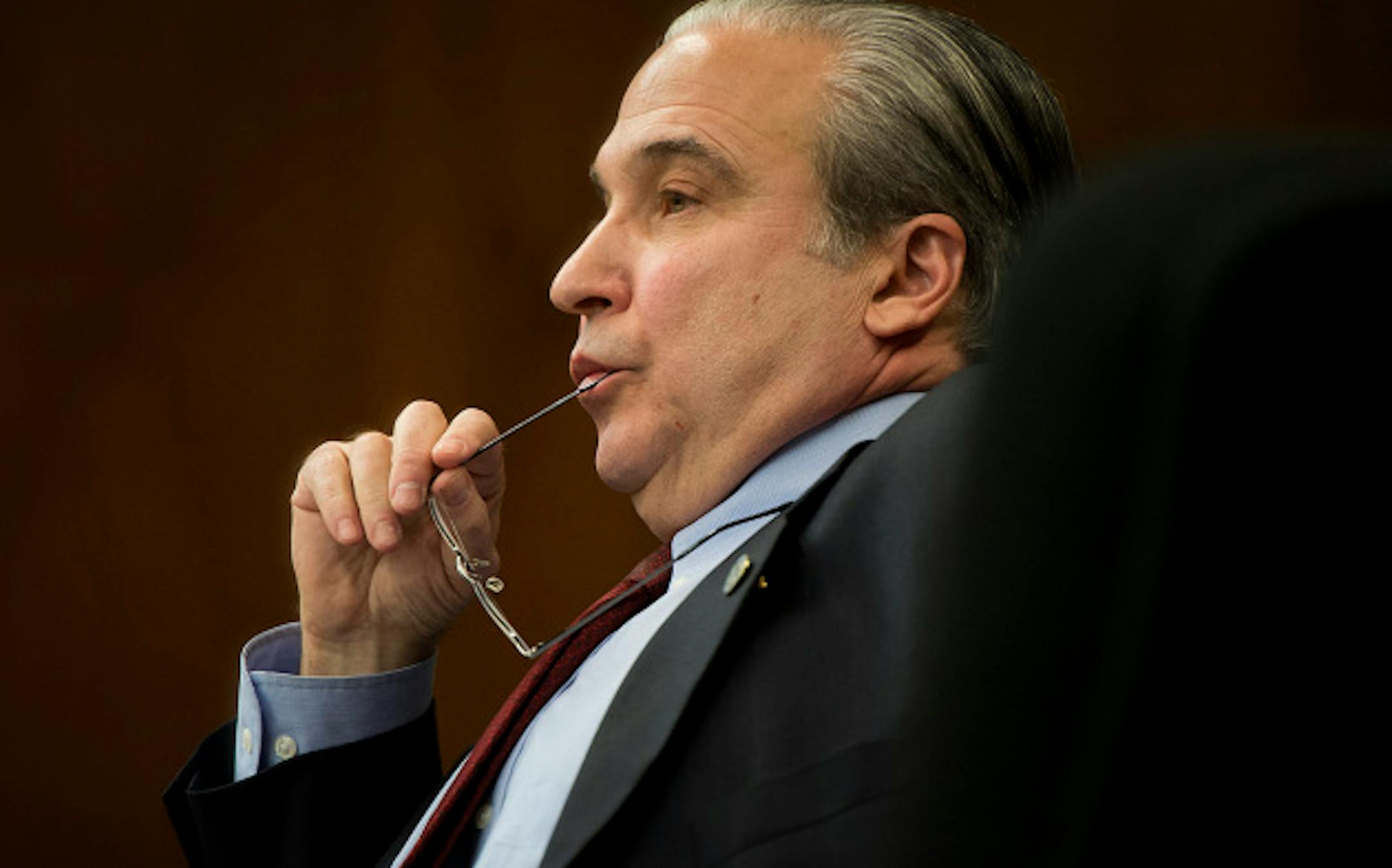 DFL Rep. Michael Paymar listened as GOP Rep. Tony Cornish ripped the background provision in his bill.  Supporters of universal background checks for guns faced a stiff test in House public safety committee Tuesday, March 19, 2013.  The bill containing background checks may not have the votes, and the sponsor is seeking a last-minute compromise to keep the concept alive.    ]   GLEN STUBBE * gstubbe@startribune.com