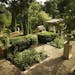 Brian Ellingson has created a formal structured garden in his Edina backyard, with brick and rock pathways and an Italian pavilion.
